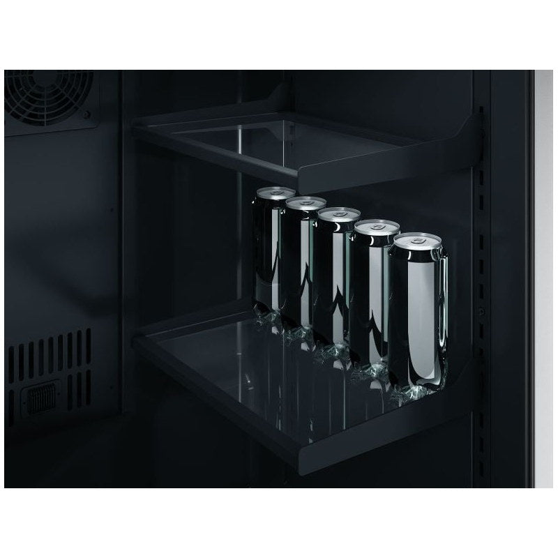 Close-up of a black interior shelf inside the Zephyr Presrv outdoor kegerator holding a row of chilled cans.