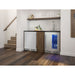 Zephyr Presrv 24-inch outdoor rated refrigerator installed under the counter of an indoor basement bar.