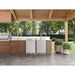 Zephyr Presrv 24-inch outdoor refrigerators in stainless steel built into a covered patio outdoor kitchen.
