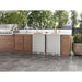 Two Zephyr Presrv 24-inch outdoor refrigerators in stainless steel built into a wood and stone outdoor kitchen island.