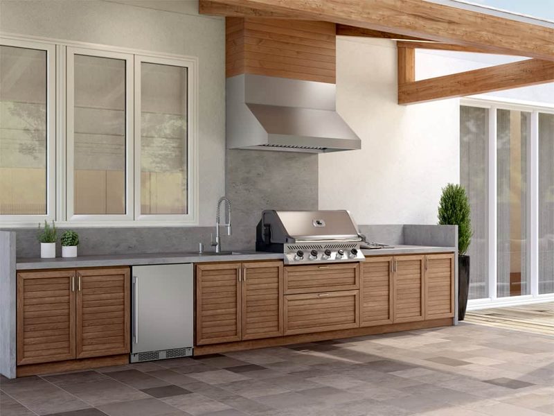 Zephyr Cypress 54-Inch Outdoor Wall Mount Range Hood Installed in Outdoor Kitchen with 12-Inch Duct Cover