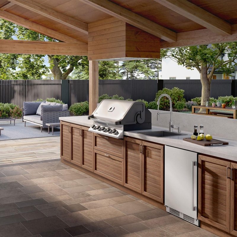 Zephyr Spruce 60-Inch Outdoor Range Hood Insert Installed in Outdoor Kitchen (Angled)